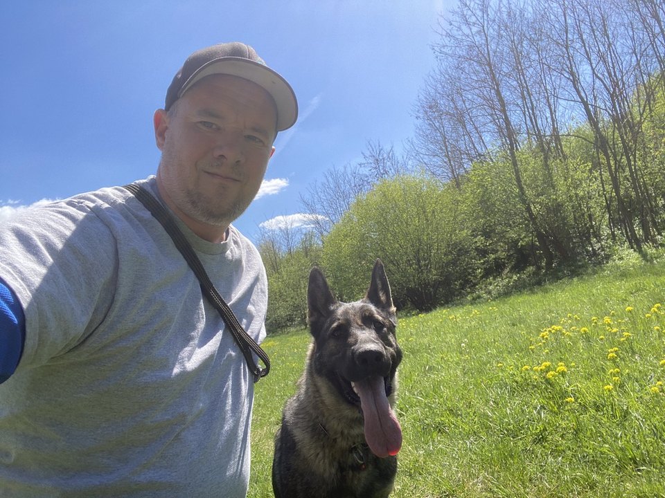 Sunny hiking with her owner